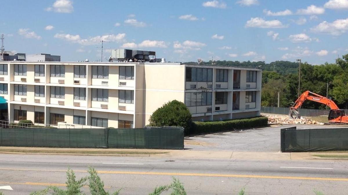 Work to demolish the old Hamilton House nursing home facility began Tuesday morning.