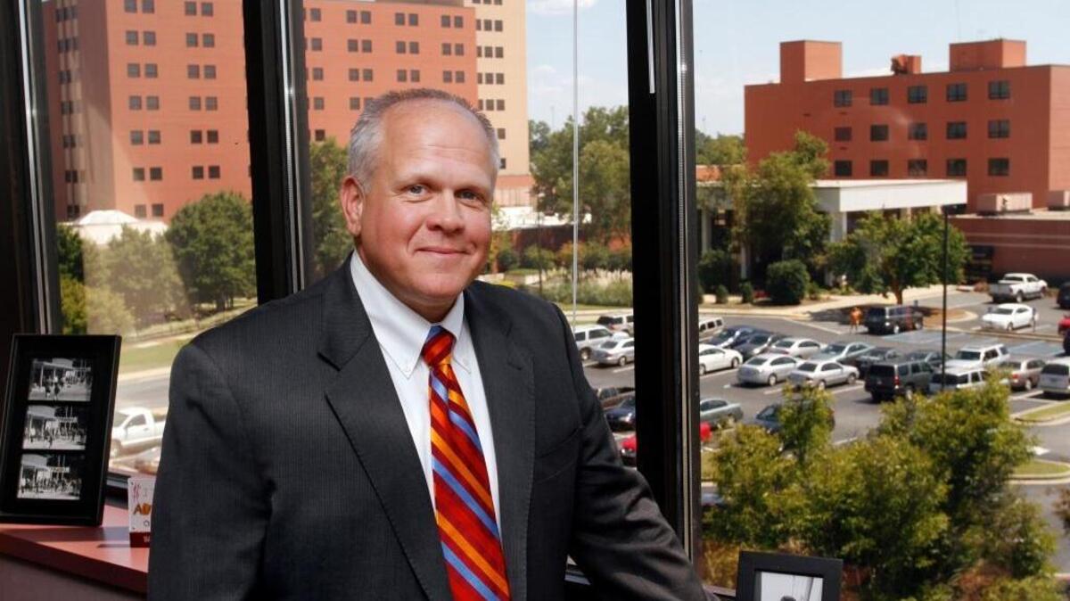 Scott Hill, CEO for Columbus Regional Healthcare, stands in his office overlooking the Midtown Medical Centeron Aug. 27, 2014.
