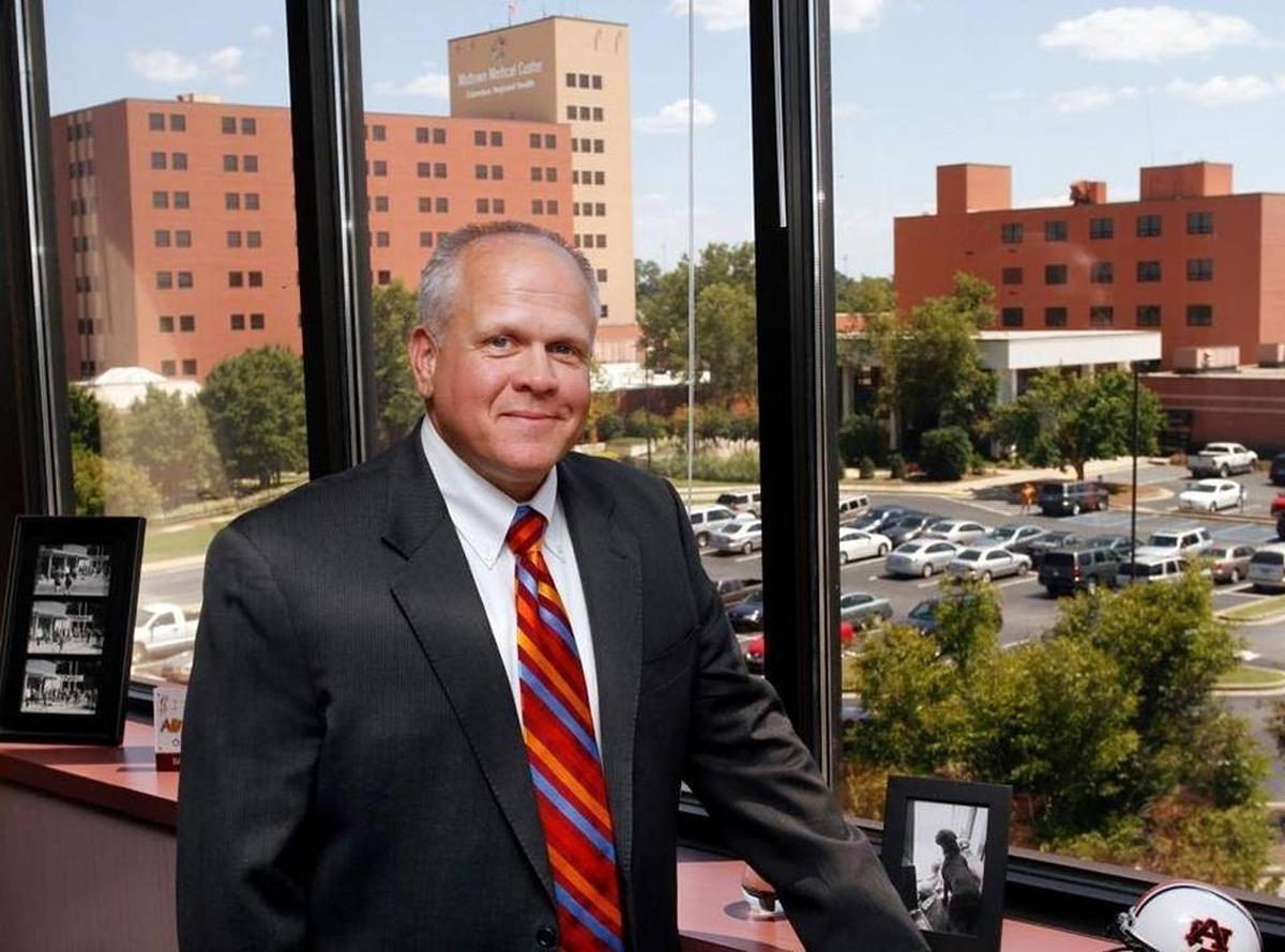 Columbus Regional Health President and Chief Executive Officer Scott Hill poses on the Midtown Medical Center campus in this file photo.