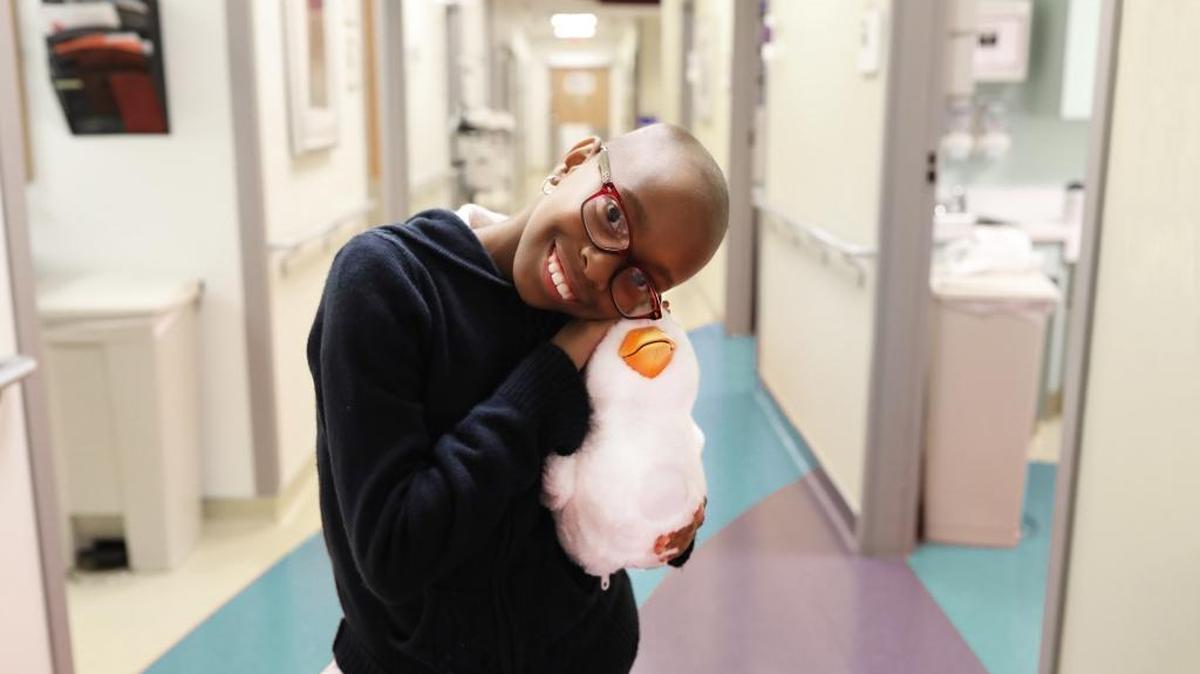 Teryn Buster, who is a cancer and sickle cell patient at the Aflac Cancer and Blood Disorders Center in Atlanta, holds a “My Special Aflac Duck.” She is 10 years old and from Lithonia, Ga. The special robotic companion duck is now in testing for a national rollout about a year from now. It was unveiled at the 2018 Consumer and Electronics Show. --