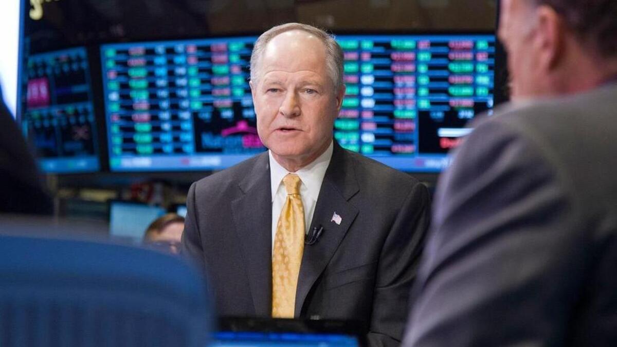 Richard Smith, chairman, CEO and president of Realogy Holdings Corp., in a 2012 photo, is interviewed at the New York Stock Exchange. --