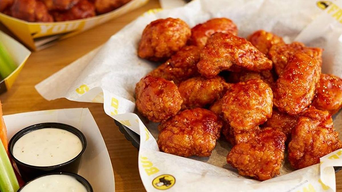 Buffalo Wild Wings, which has a location at Columbus Park Crossing, will soon be owned by Atlanta-based Arby’s Restaurant Group. --