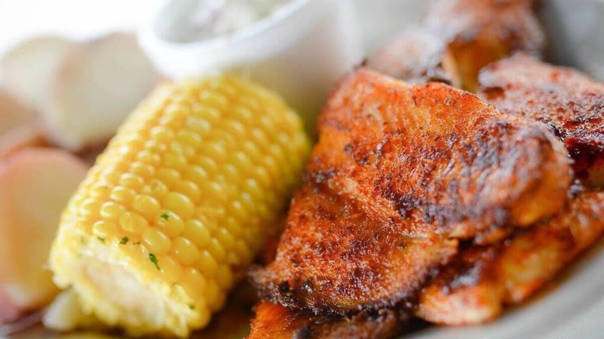 Grilled mahi is among the dishes on the Shrimp Basket menu. The company opened a restaurant March 16 at 6073 Veterans Parkway in Columbus. --