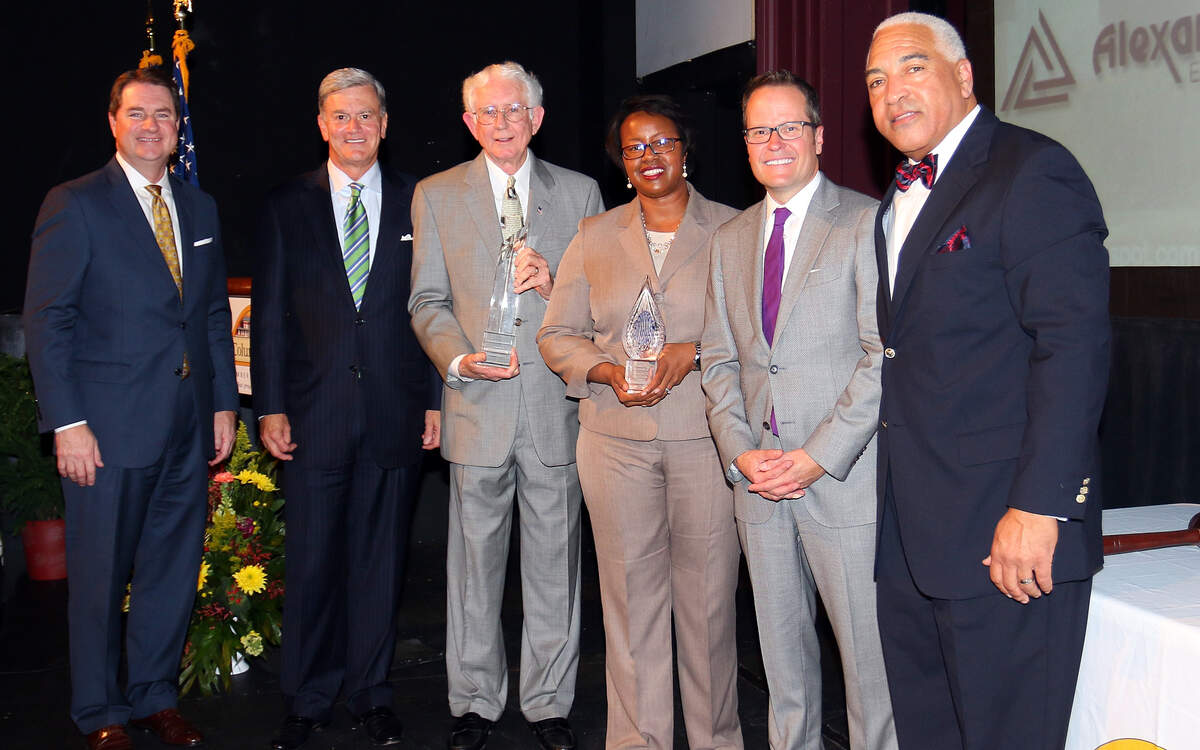 The Greater Columbus Chamber of Commerce annual meeting was held Thursday at the historic Liberty Theater on Eighth Avenue. Shown after the gathering (l-r) is Brian Anderson, president and CEO of the Columbus chamber, Troy Woods, outgoing chamber chair for 2015, Frank Brown, recipient of the Jim Woodruff Jr. Memorial Award, Crystal Pendleton Shahid, recipient of the J.R. Allen Young Leader Award, Chris Clark, president and CEO of the Georgia Chamber of Commerce, and Cedric Hill, incoming Columbus chamber chair for 2016.