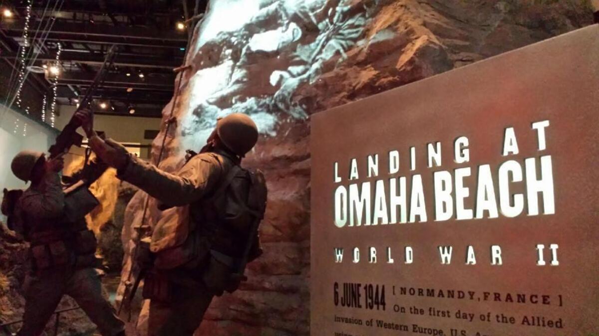 A scene from the D-Day landing at Omaha Beach during World War II is part of “The Last 100 Yards,” the signature attraction within the National Infantry Museum and Soldier Center. --