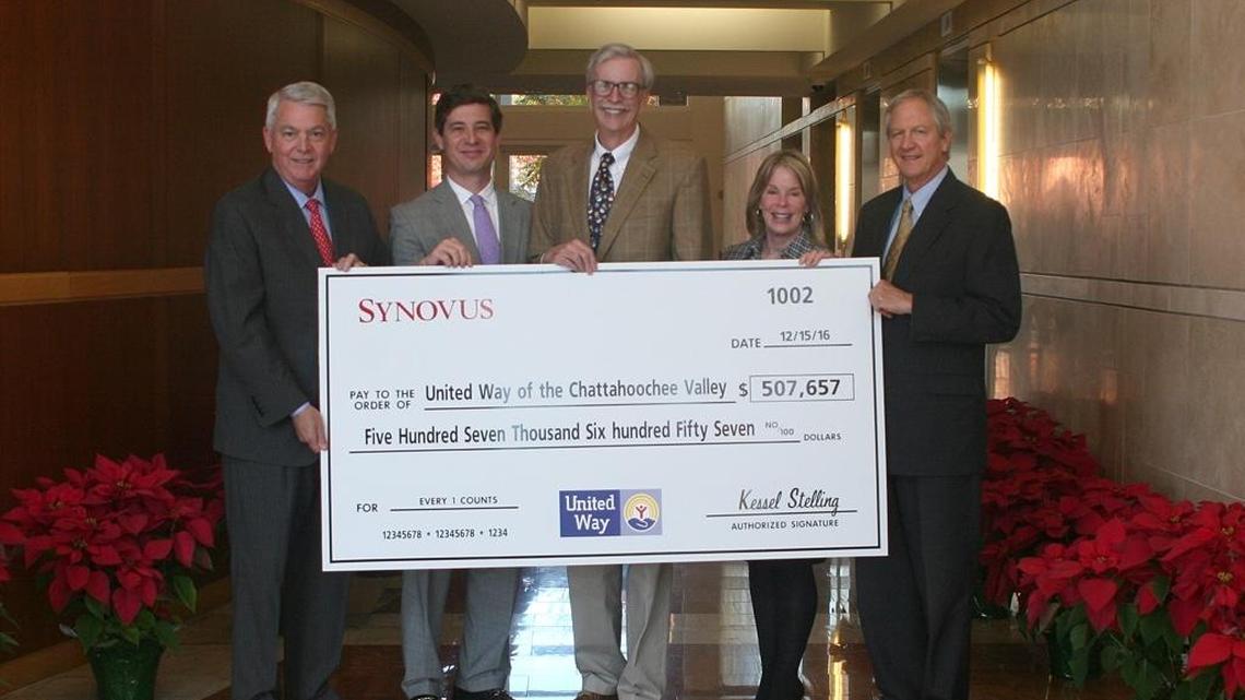 Participating in the $507,657 check presentation Thursday at Synovus Centre in Columbus are (left to right) Synovus Chairman and CEO Kessel Stelling, incoming Columbus Bank and Trust President Heath Schondelmayer, Scott Ferguson and Becky Fletcher of United Way of the Chattahoochee Valley, and Wade Burford, president and CEO of CB&T of East Alabama. --