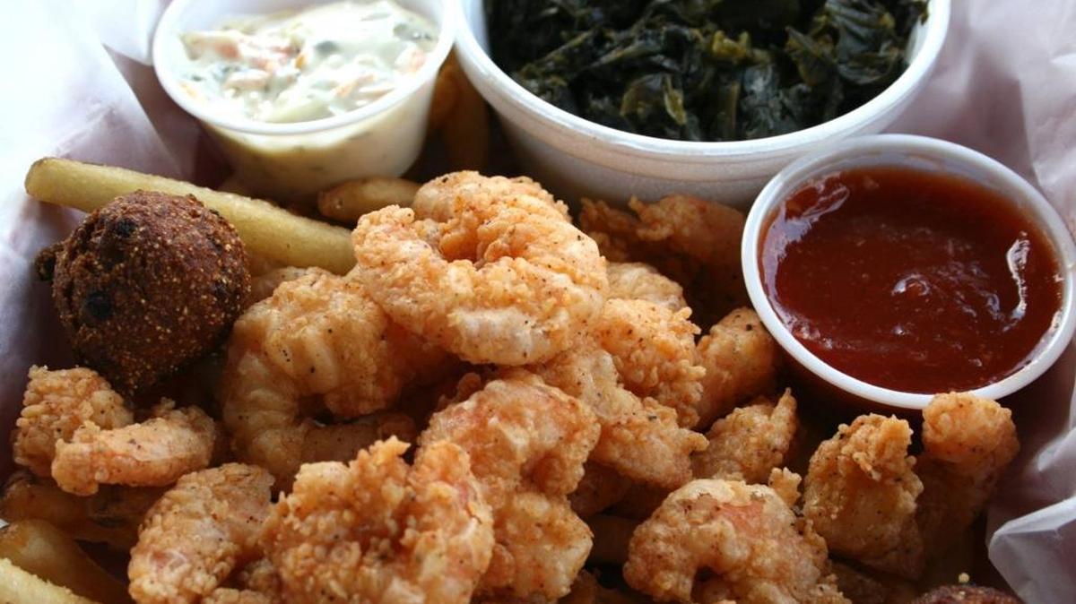 This was a recent Wednesday daily special of all-you-can-eat fried popcorn shrimp and sides at The Shrimp Basket. --