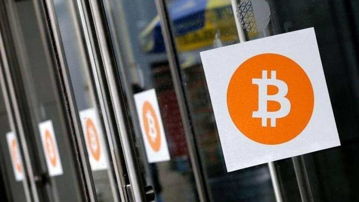 Bitcoins are gaining respectability as a digital currency, leading to massive price speculation. Here logos are displayed at the Inside Bitcoins conference and trade show in New York.