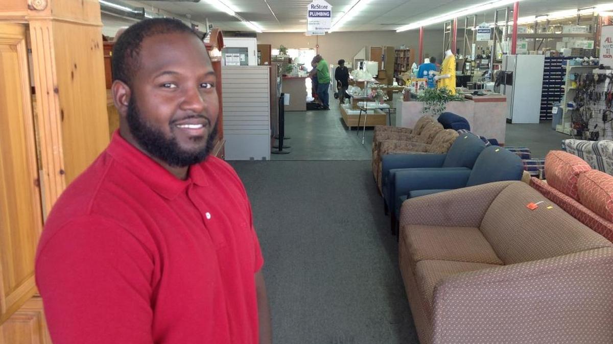 Fernando Vega inside the ReStore at 3520 River Road in Columbus. The outlet sells gently used furniture, appliances, cabinets, doors, plumbing and lighting fixtures, among other things.