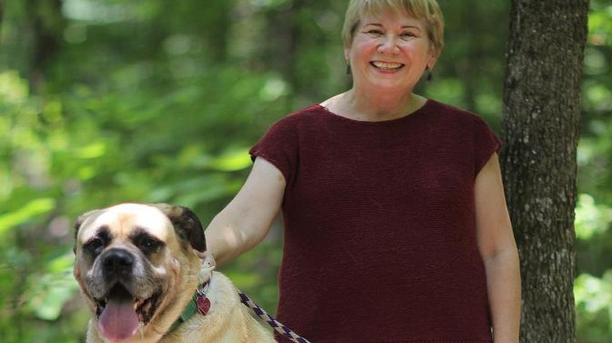 Bobbi Yeo, chief executive officer of Paws Humane, is currently fostering Lucy, one of many pets available for adoption at the facility located at 4900 Milgen Road in Columbus.