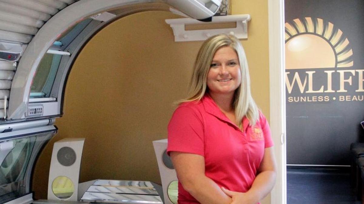 Kristen Carroll is owner and a spray tan technician at New Life Tanning Center at 1701 Rollins Way in the Bradley Park Drive shopping and dining area of Columbus.
