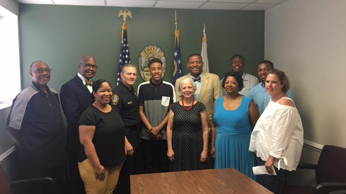 Participants and supporters in the Greater Achievement Youth Empowerment Academy tutoring program in LaGrange include program coordinator Glenn Dowell (back row, second from left), Police Chief Lou Dekmar (back row, third from left) and executive director Willie Mae Callaway (front row, third from left).