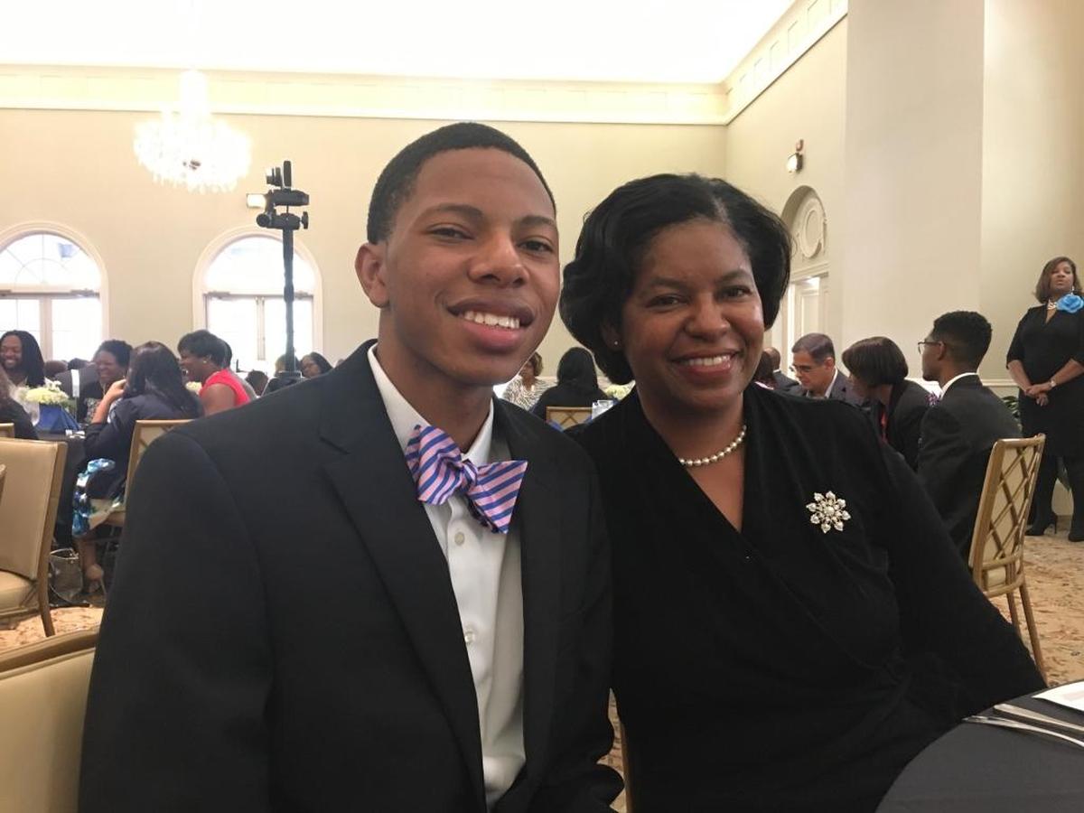 Austin Baker and his mother, Dolly, attend a Jack and Jill beau brunch and talent show at Green Island Country Club. Baker is one of 21 beaux in the 20th Biennial Beautillion Ball scheduled for Dec. 16 at the Columbus Convention and Trade Center.