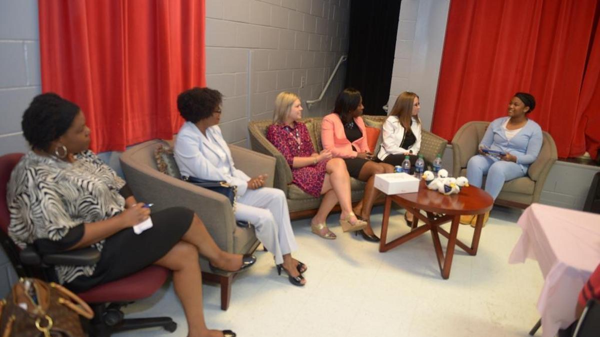 Fourteen-year-old Olivia Hamilton, far right, serves as a facilitator for the panel discussion at the Bold Moves summer program at the Girls Inc. Baker Center on Levy Road. From left to right, the panelists were Teresa White, president of Aflac U.S.; Alva James-Johnson, Ledger-Enquirer social issues reporter; Heather Avery, Aflac vice president of customer strategy and analytics; Tash-Marie Cheney, Aflac resource manager and budget lead; Tashia Brandenburg, Aflac senior manager of IT project management.