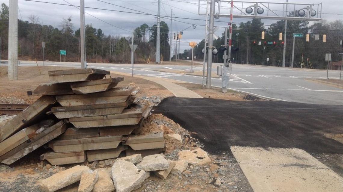 Some railroad crossings in Columbus were repaired with asphalt where the concrete was broken or cracked. This location is at Technology Parkway and Macon Road in Midland.