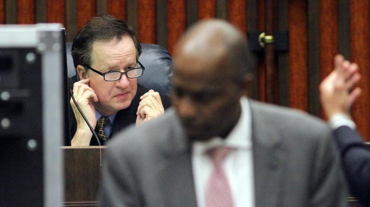 Superior Court Judge Gil McBride listens to an attorney's motion Wednesday during day two of the Upatoi triple-murder trial in Superior Court.
