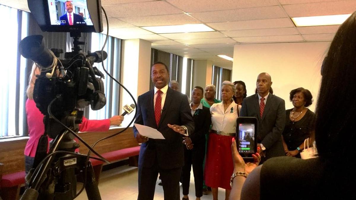 Mayoral candidate Zeph Baker speaks to reporters after a judge upheld the local elections board’s rejecting a challenge to his residency.