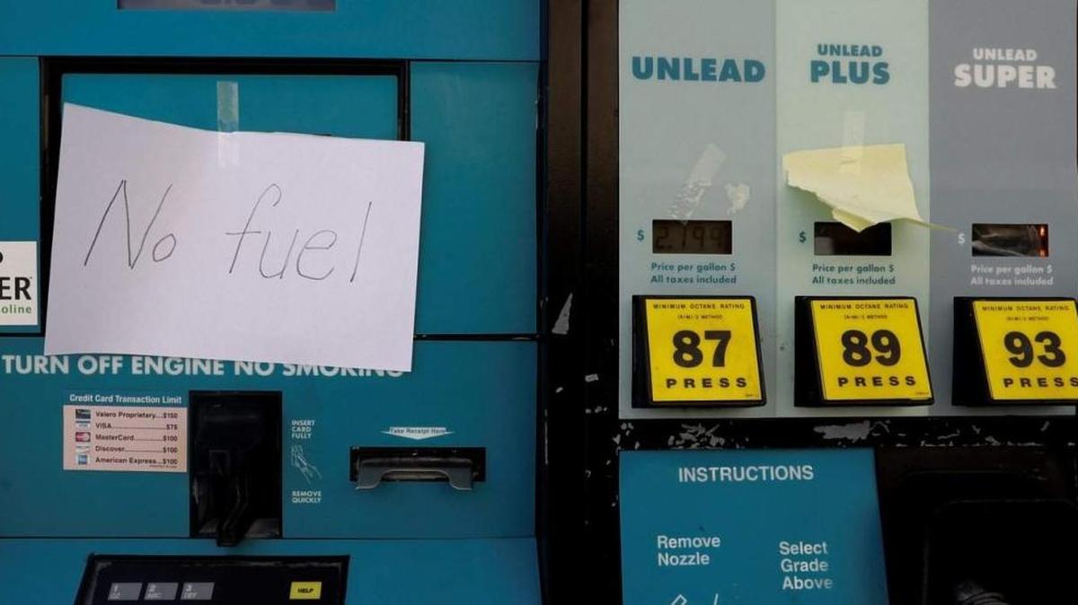 A sign shows fuel pumps out of gas.