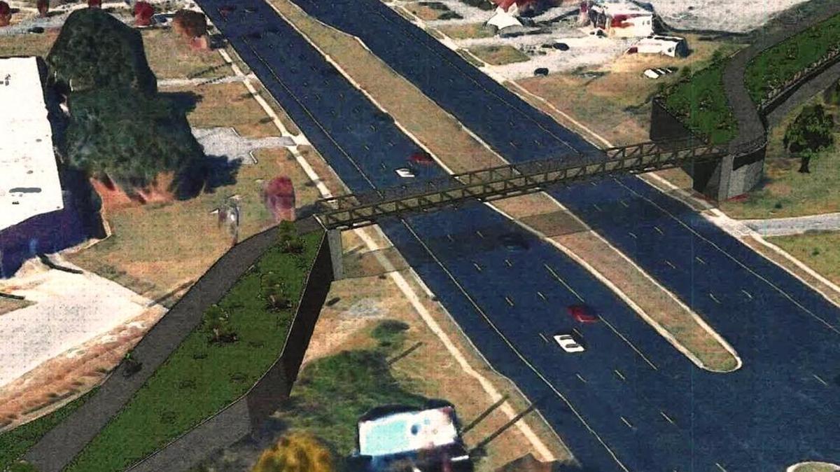 An artist’s rendering of a proposed pedestrian bridge over Victory Drive.