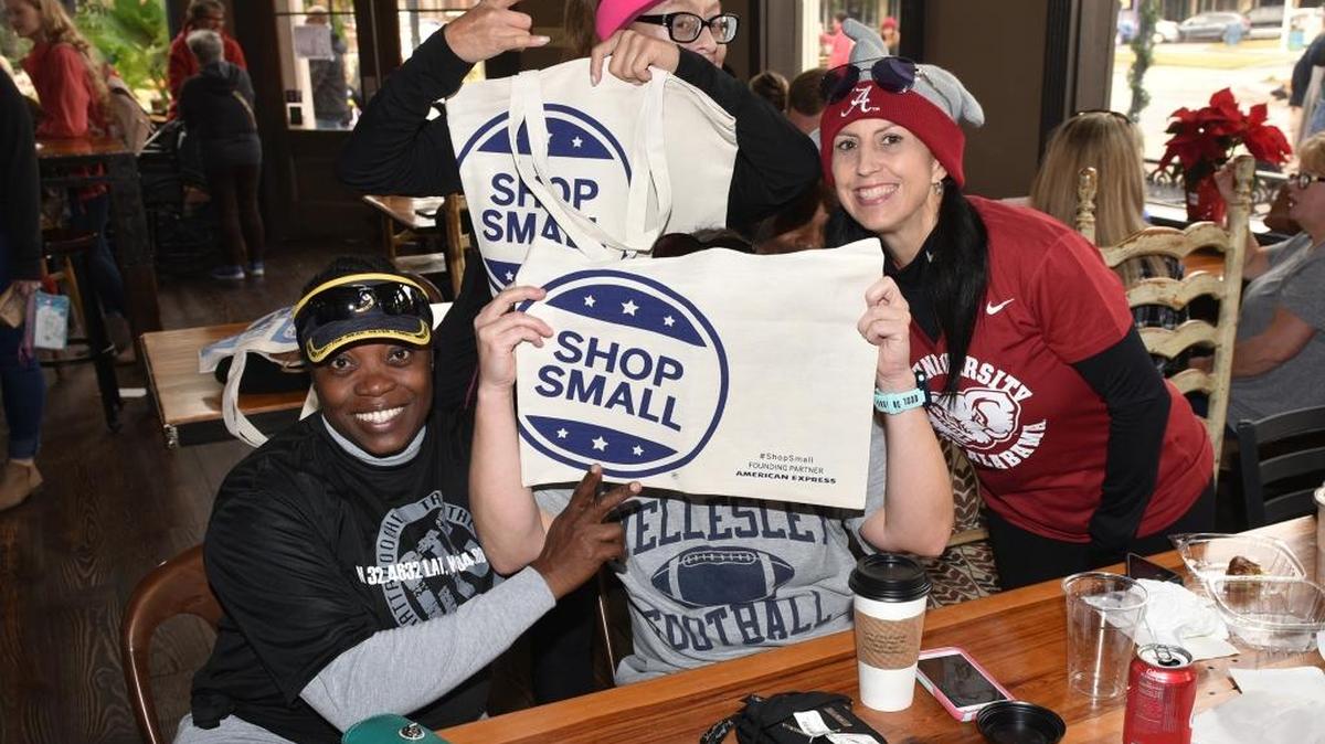 Randi Lewis, Gina Redondo,Bonnie Pergl, (behind Shop small bags) and Renee Bowles at Iron Bank Coffee Company supporting promoting Small Business Saturday, November 25, 2017