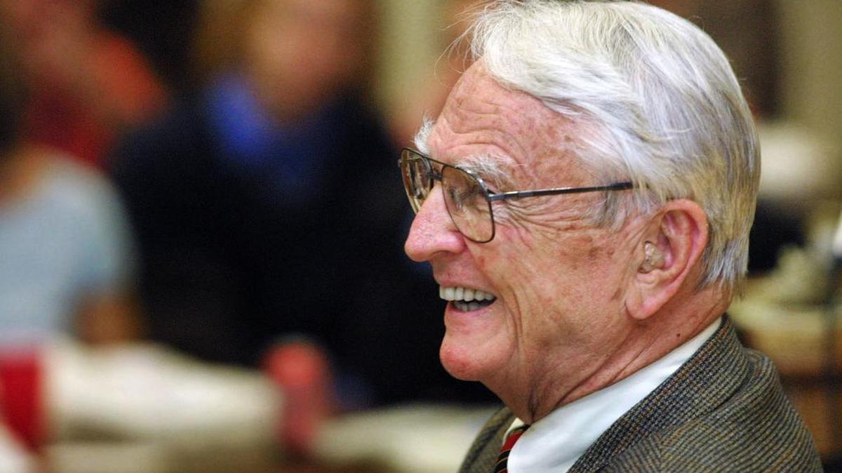 Columbus business and community leader Bill Turner laughs with the crowd during the question and answer portion of his talk on servant leadership in 2002 at St. Paul United Methodist Church.