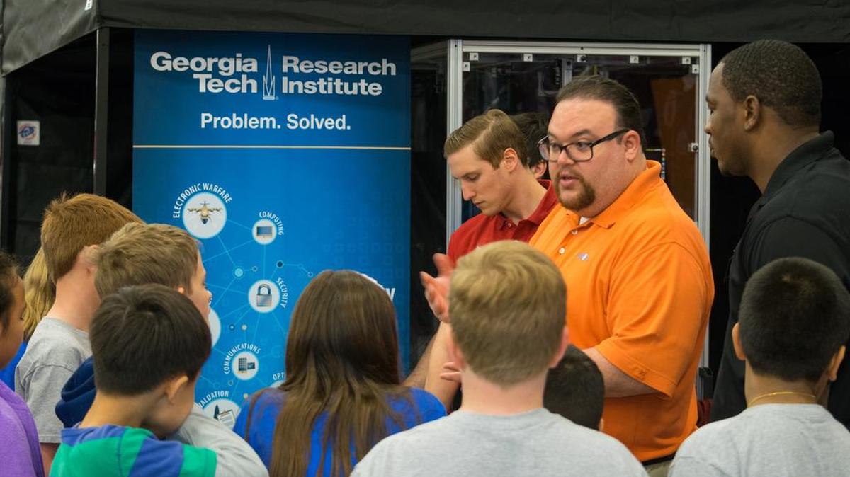 Columbus youths check out the Georgia Tech booth at the 2016 Let's Grow STEAM expo.