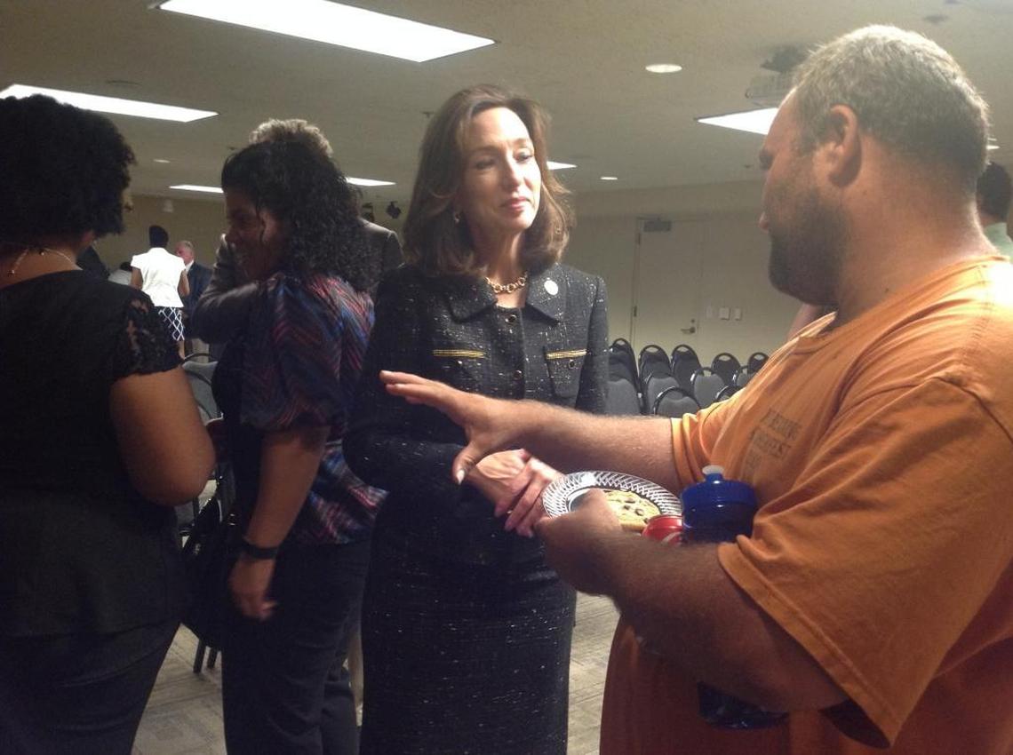 Mayor Teresa Tomlinson speaks with east Columbus resident Jonathan Jones, following her 28th “Let’s Talk with the Mayor” forum, which was held at the Columbus Museum.