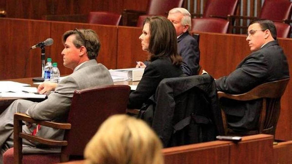 Former Sheriff John Darr (far right) sits in a hearing with his lawyers. Darr’s lawsuit, along with former Superior Court Clerk Linda Pierce’s, against the city have been dismissed by their successors.