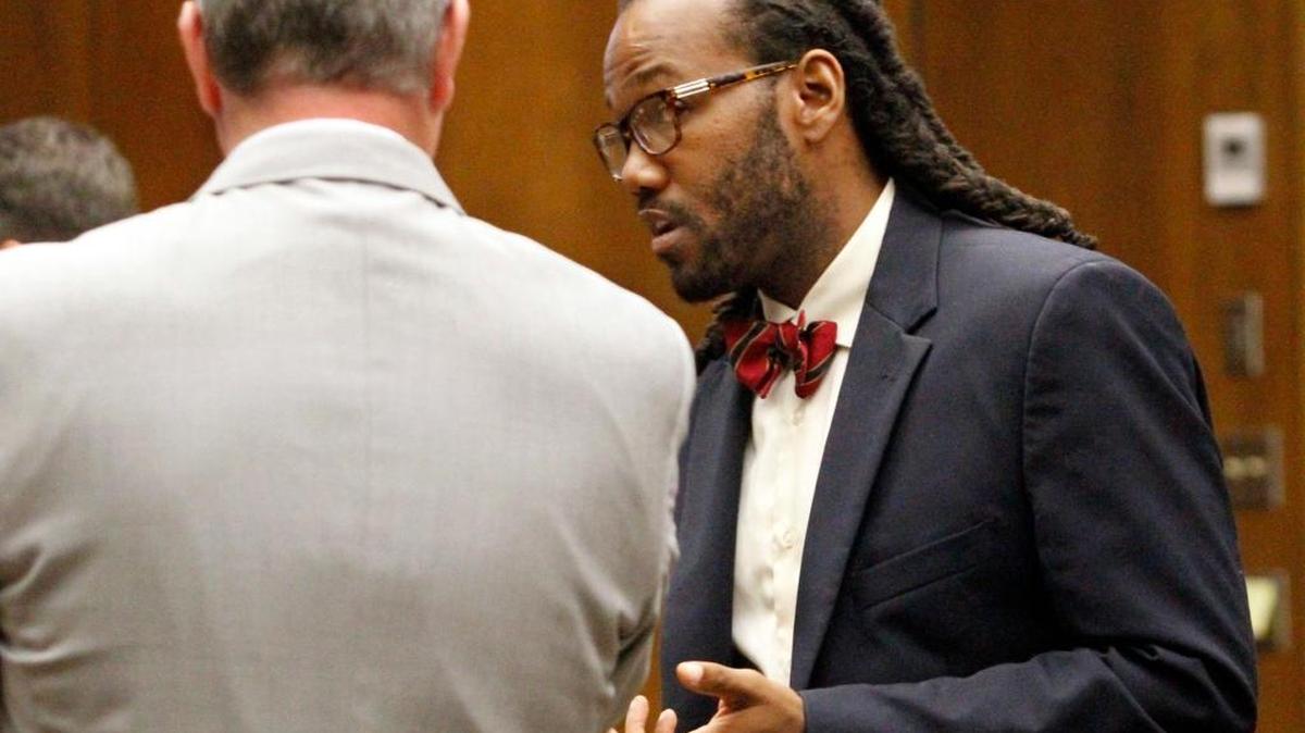 Defense attorney William Kendrick, right, talks with prosecutor Don Kelly during a scheduling hearing for Brandon Conner, charged with capital murder in the 2014 deaths of girlfriend Rosella Mitchell and their 6-month son Dylan Conner.