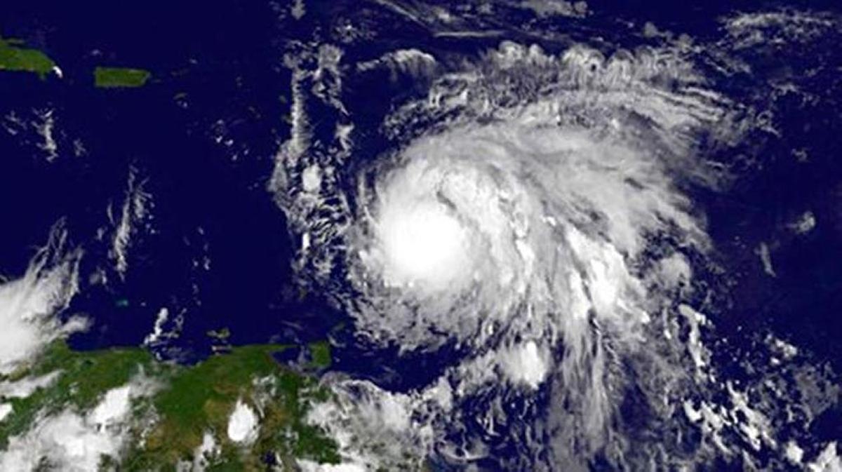 This Sunday, Sept. 17, 2017, GOES East satellite image provided by NASA taken at 7:45 p.m EDT, shows Hurricane Maria as it approaches the Lesser Antilles.