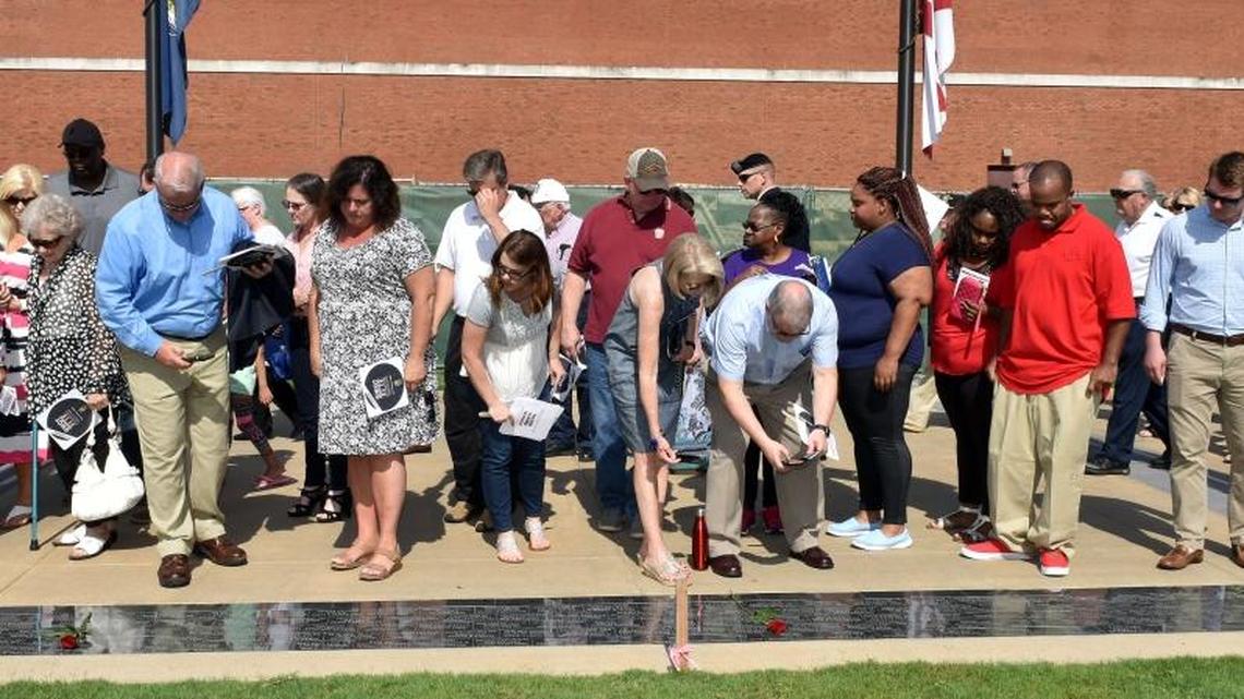 Family members viewing paving stones of their loved ones during the National Infantry Museum Heritage Walk Paver Dedication Ceremony Memorial Day May 29, 2017