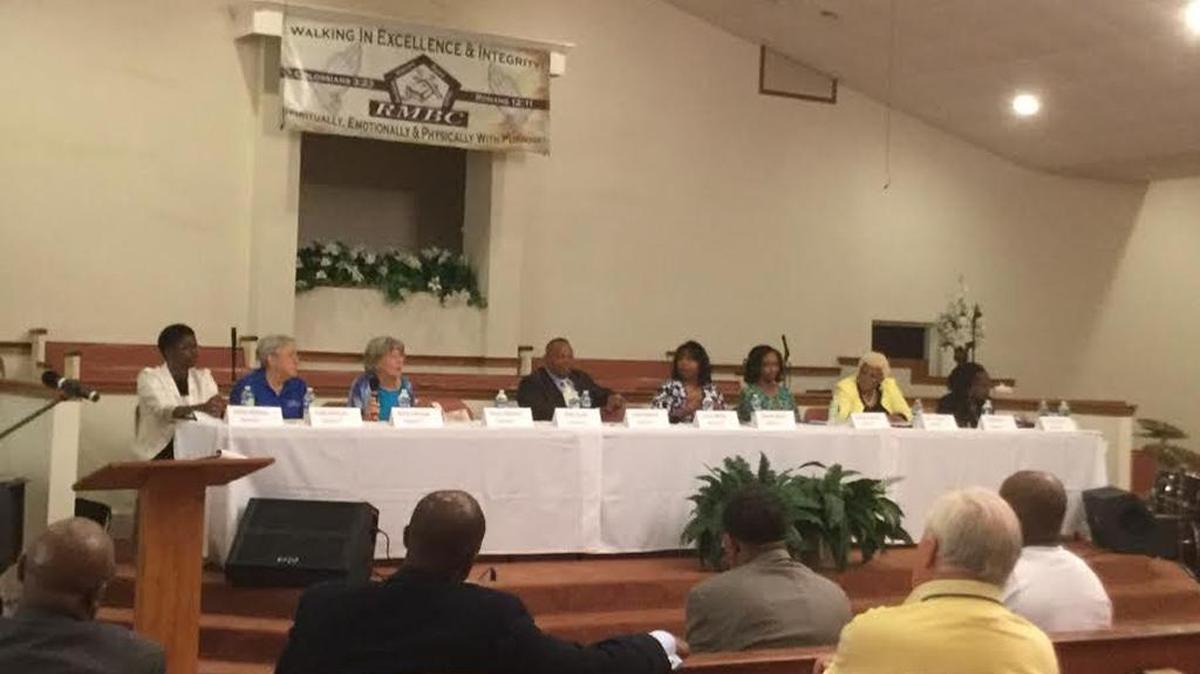 Candidates for the Muscogee County School Board make pitches to voters Saturday at Revelation Missionary Baptist Church.