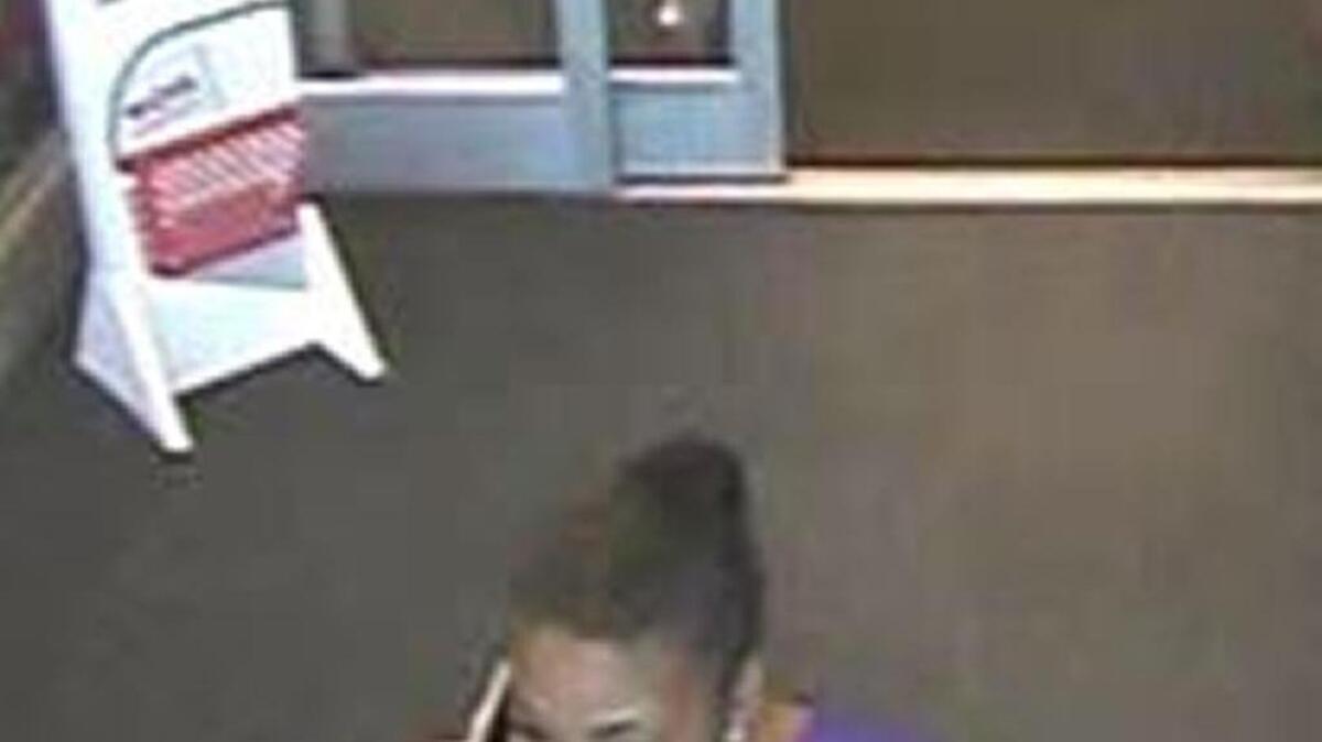 Authorities are searching for a woman accused of nabbing perfume bottles in a June 6 theft at the Target on Enterprise Drive, according to a news release from the Opelika Police Department.