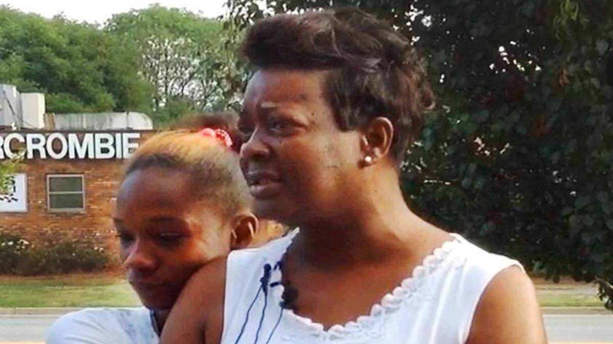 Shondrell Reese, sister of Lekeshia Moses, hugs her grandmother Marylin Butler as they speak Tuesday morning about the loss of Moses after a preliminary hearing in Columbus Recorder’s Court for Lernard Bonner, the man accused of killing Moses at Wilson Homes.
