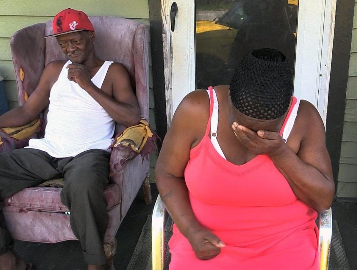Shirley Coleman,right, weeps as she remembers her nephew Michael Jerome Fleming, who was killed in July 2017. Fleming’s father Jack Coleman is also pictured.