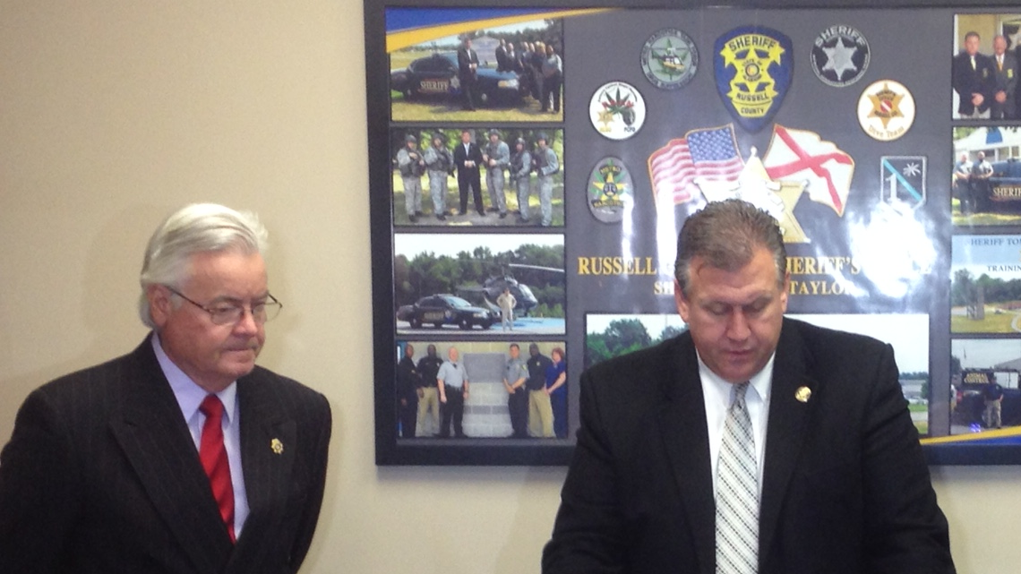 Russell County District Attorney Ken Davis and Sheriff Heath Taylor hold a news conference concerning a double homicide in Fort Mitchell.