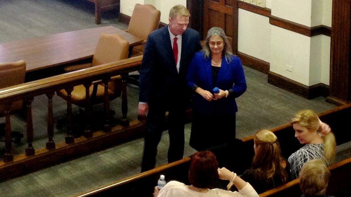 Samuel and Diana Franklin talk to supporters during a break in testimony in this L-E file photo. Samuel pleaded guilty to multiple charges Friday.