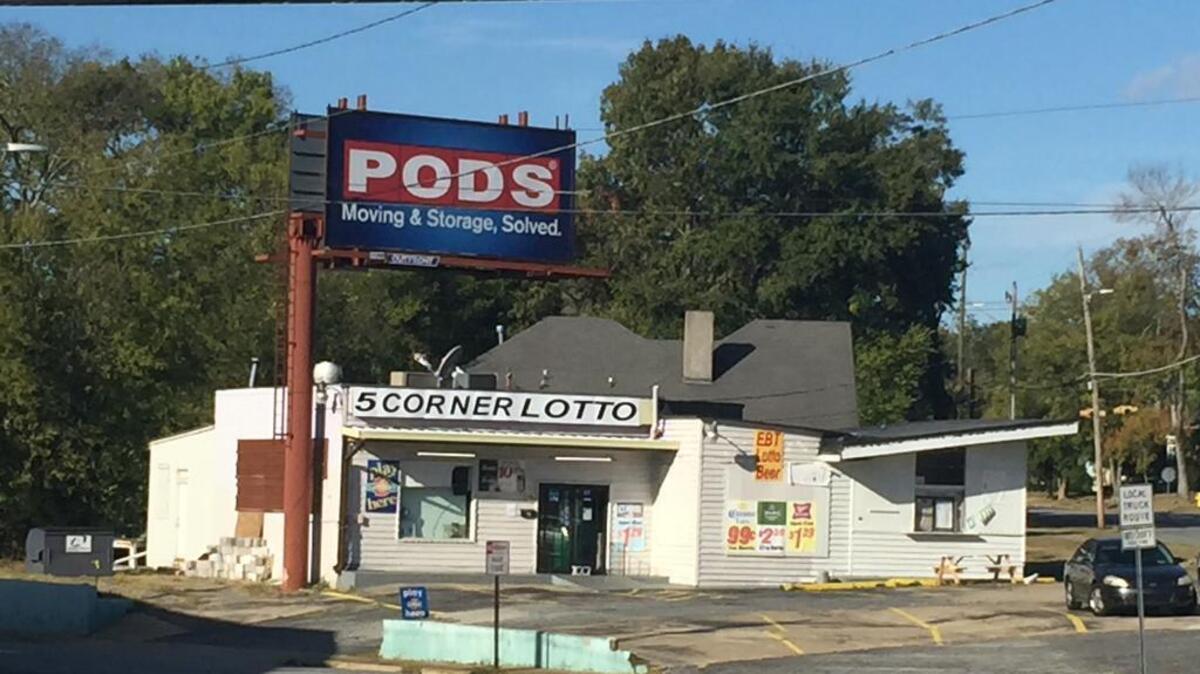 A 23-year-old man was killed and his father was wounded Sunday night during an apparent attempted robbery at the 5 Corner Lotto on Linwood Boulevard in Columbus.