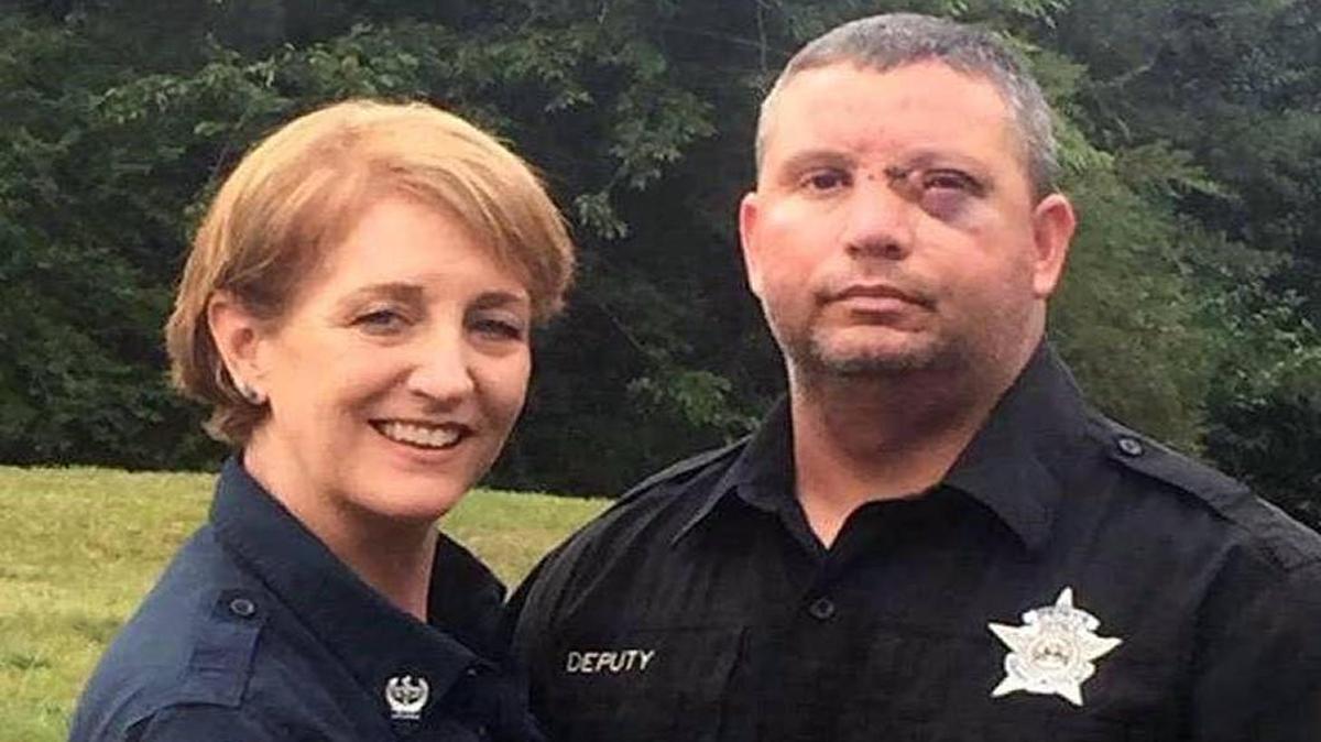 Harris County Sheriff’s Deputy Jamie White with wife after his release from the hospital.
