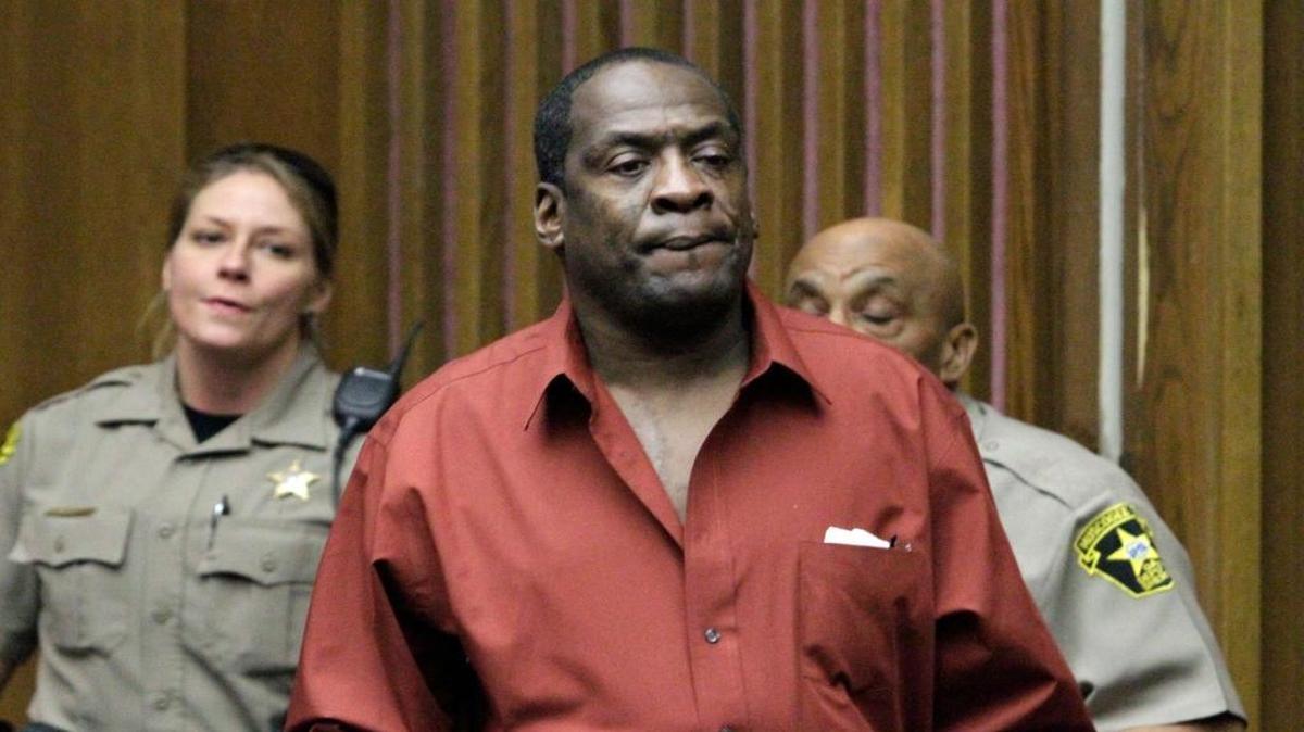 Jerry Wayne "Scarface" Merritt is escorted into Superior Court as his trial continues in the June, 6, 2014 death of Anthony Wayne "Red" Taylor.