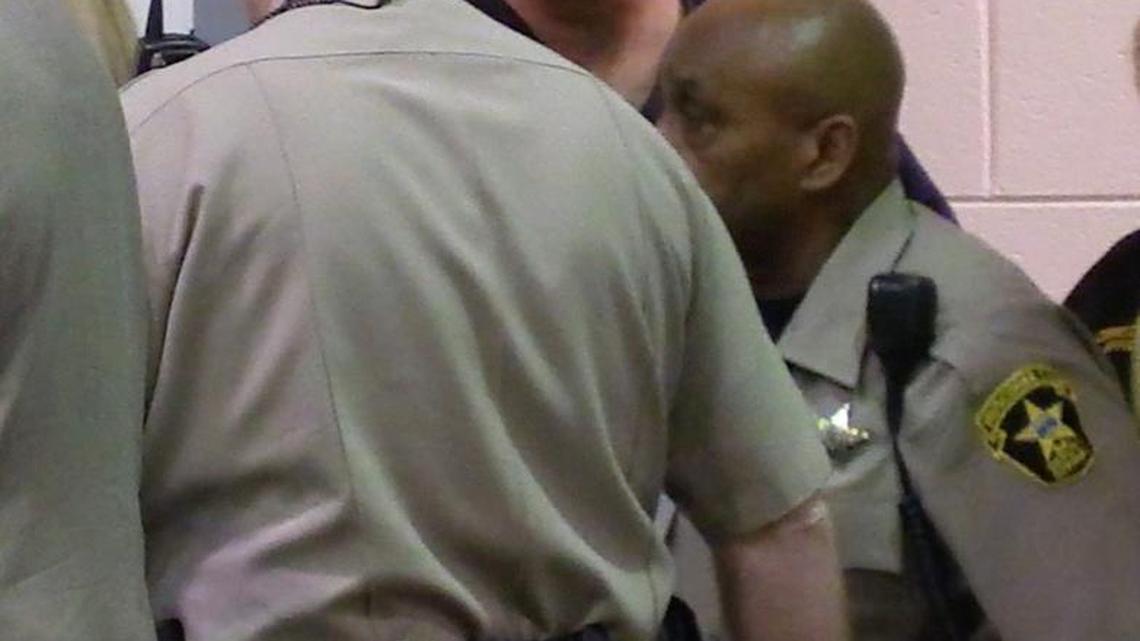 Timothy Tarr , facing camera, is escorted into Columbus Recorder's Court. Tarr pleaded not guilty to murder, aggravated assault and possession of a firearm during the commission of a crime. He was ordered held in the Muscogee County Jail with bond.