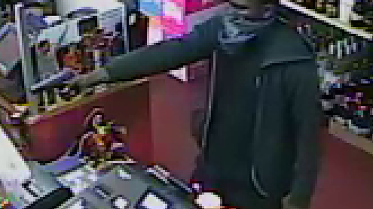Columbus Police released survillence photos Wednesday afternoon of the unidentified suspect who alledgely robbed on March 19 the Hidden Lake Bottle Shop in Columbus.