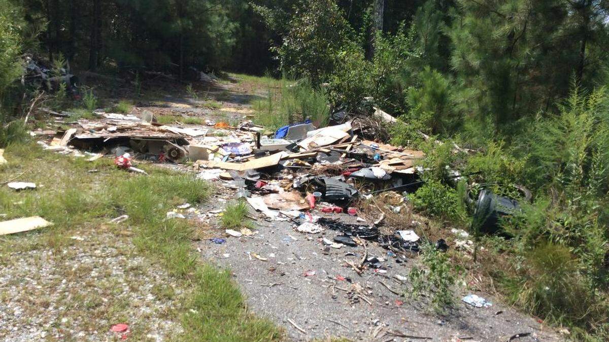 This trash was found on a vacant lot in the 900 block of Farr Road in Columbus. The city is taking bids from contractors to clean up the property, an official said.