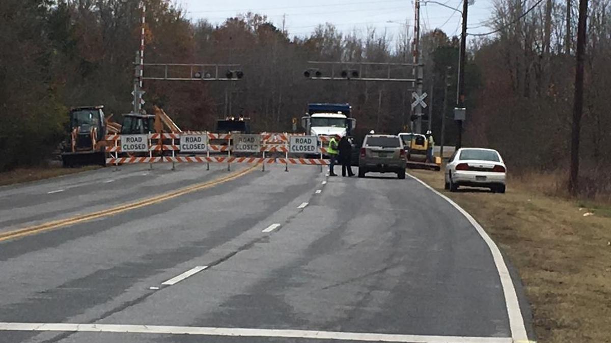 Crews blocked a section of Woodruff Farm Road in Columbus on Dec. 7, 2017 to repair the crossing along the Norfolk Southern railroad. They hope to finish work at this crossing today if weather allows it.