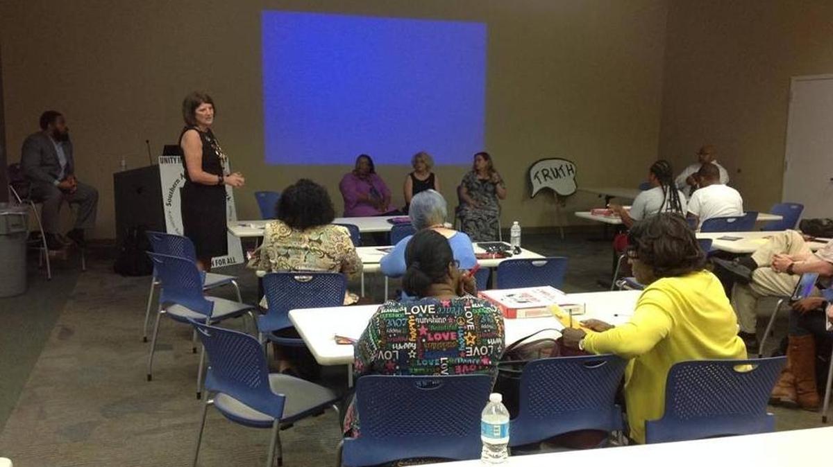 Debra Singley, principal of the Camelot Therapeutic Day School of the Quad Cities in Moline, Ill., speaks April 18, 2017, in the Mildred L. Terry Public Library during the public forum about alternative education in the Muscogee County School District.