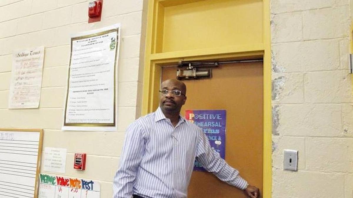 In this Feb. 10, 2015, photo, Spencer High School principal Johnny Freeman, shows structural damage and other problems throughout the building, now 39 years old.