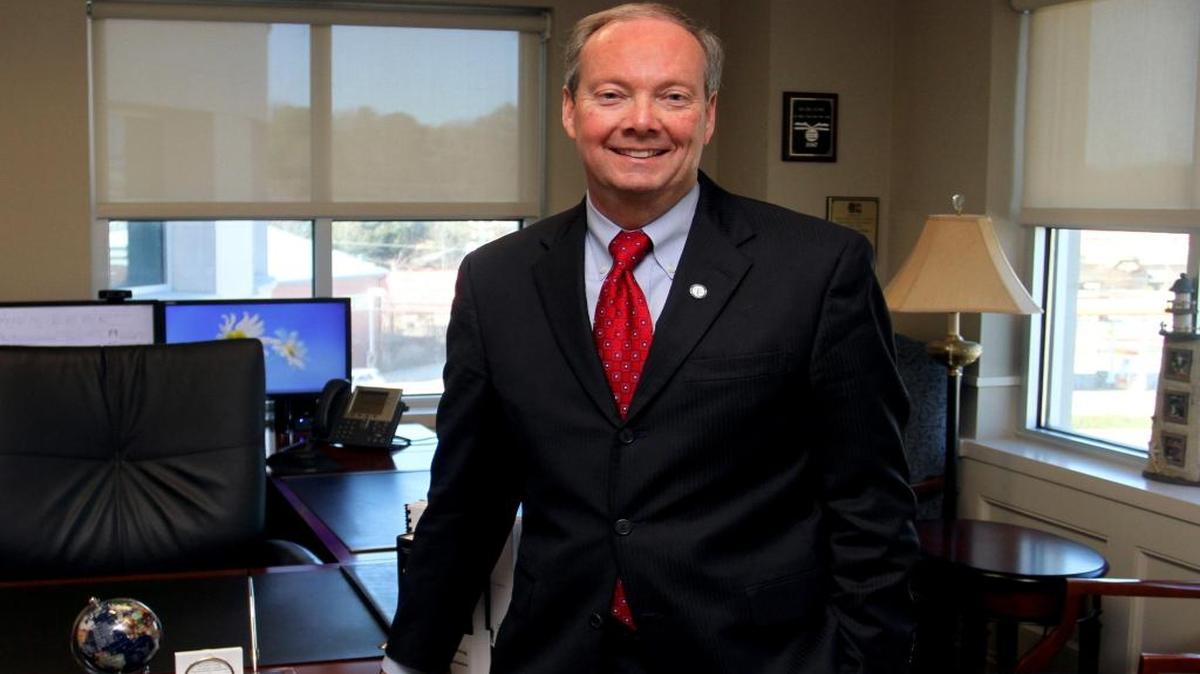 Muscogee County School District superintendent David Lewis poses inside his office.