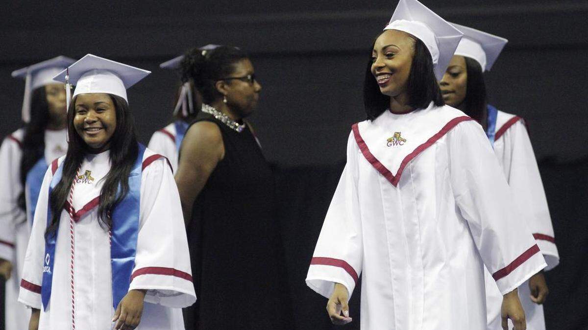 Spotted at the G.W. Carver High graduation ceremonies at the Columbus Civic Center.
