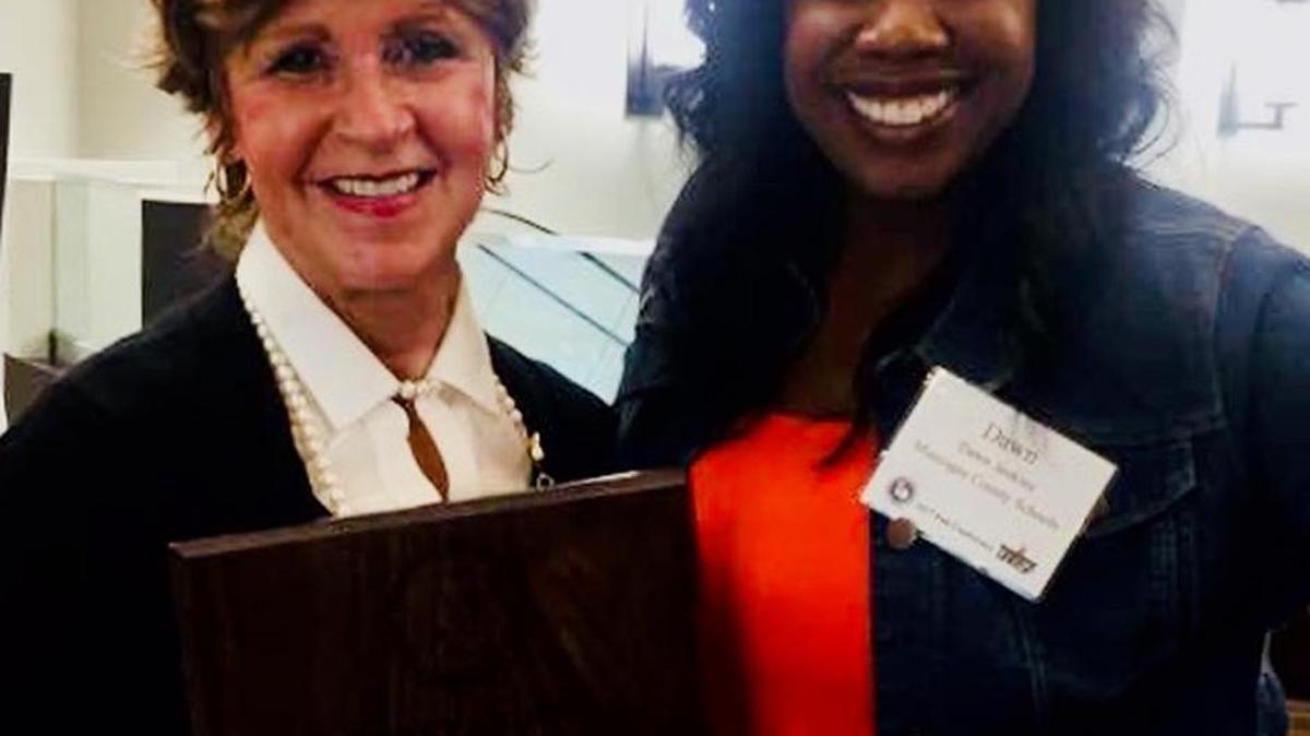 Helen Johnson, left, group vice president for community development at CB&T, poses Nov. 6, 2017, with South Columbus Elementary School principal Dawn Jenkins after Johnson won the 2017 Distinguished Educational Patron Award from the Georgia Association of Elementary School Principals during the GAESP’s conference in Savannah.