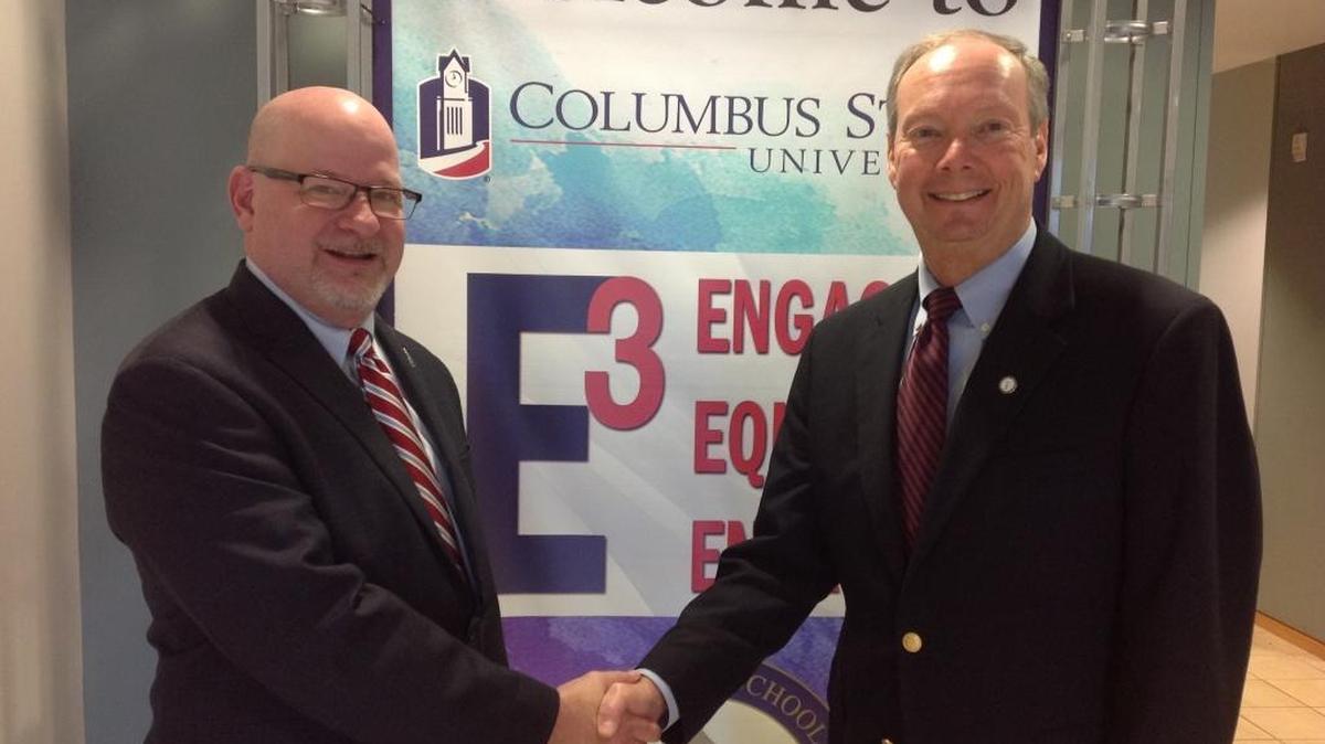 Columbus State University president Chris Markwood, left, and Muscogee County School District superintendent David Lewis say they are committed to growing the partnership between their institutions. They were among the approximately 200 educators who gathered Monday in CSU’s Cunningham Center for the start of the two-day E3 Conference to “engage, equip and energize” students and better prepare them for the workforce.